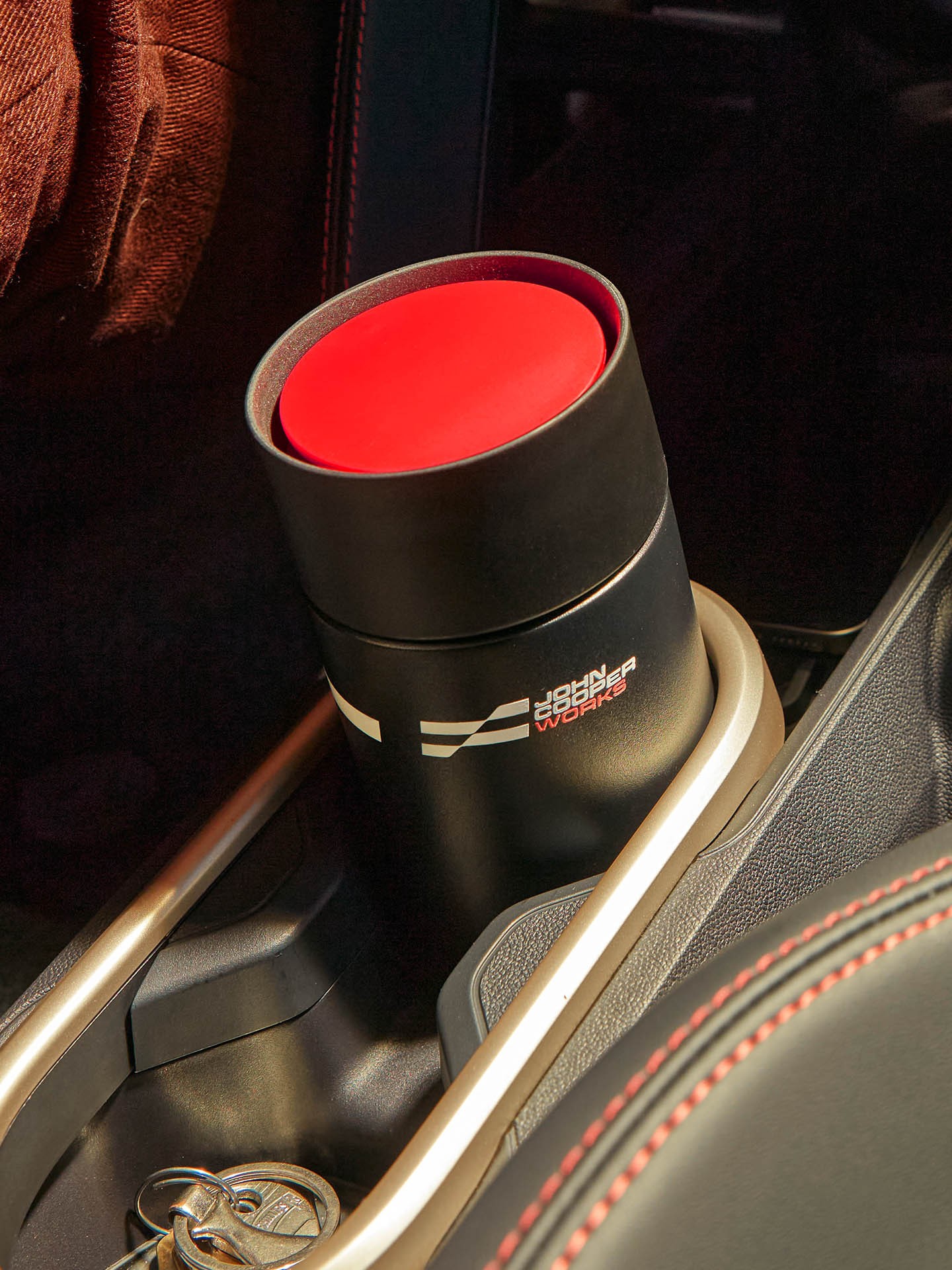 Black thermocup with red lit and JCW badge